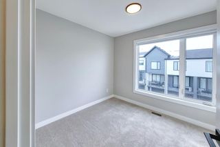 Photo 24: 216 Evanscrest Square NW in Calgary: Evanston Row/Townhouse for sale : MLS®# A2023470