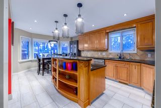 Photo 12: 7315 Bow Crescent NW in Calgary: Bowness Detached for sale : MLS®# A2030875