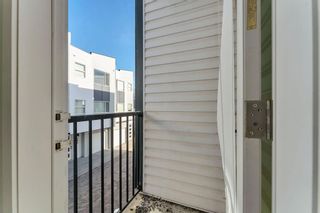 Photo 9: 113 101 Panatella Square NW in Calgary: Panorama Hills Row/Townhouse for sale : MLS®# A2053584