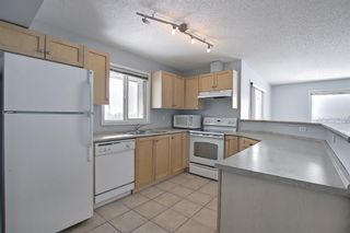 Photo 18: 7402 304 MacKenzie Way SW: Airdrie Apartment for sale : MLS®# A1081028