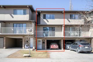 Photo 1: 48 1055 72 Avenue NW in Calgary: Huntington Hills Row/Townhouse for sale : MLS®# A2053865