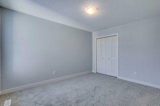 Photo 11: 71 Belvedere Green SE in Calgary: Belvedere Detached for sale : MLS®# A2100390