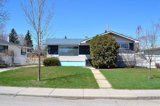 Photo 1: 45 Mayfair Road SW in Calgary: Meadowlark Park Detached for sale : MLS®# A1064150