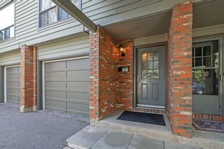 Photo 3: 125 Point Drive NW in Calgary: Point McKay Row/Townhouse for sale : MLS®# A2131041