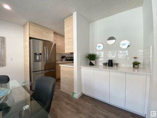 Photo 2: 302 VILLAGE ON THE Green in Edmonton: Zone 02 Townhouse for sale : MLS®# E4384429