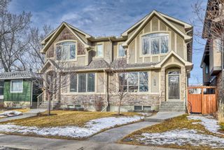Photo 1: 2118 2 Avenue NW in Calgary: West Hillhurst Semi Detached for sale : MLS®# A1175234