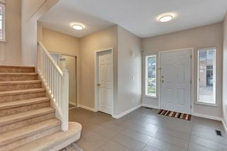 Photo 2: 37 1751 PADDOCK Drive in Coquitlam: Westwood Plateau Townhouse for sale : MLS®# R2579249