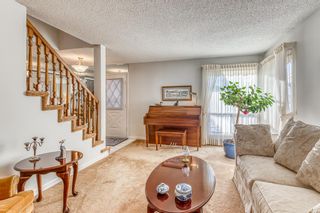 Photo 7: 375 Woodfield Road SW in Calgary: Woodbine Detached for sale : MLS®# A2011027