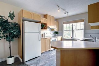 Photo 15: 801 7171 Coach Hill Road SW in Calgary: Coach Hill Row/Townhouse for sale : MLS®# A1242301