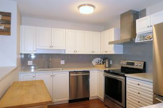 Photo 7: 409 33708 KING Road in Abbotsford: Poplar Condo for sale in "College Park Place" : MLS®# R2448232
