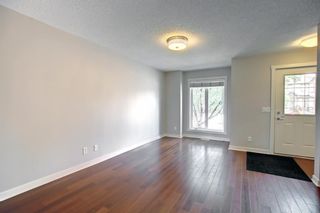 Photo 14: 104 2445 Kingsland Road SE: Airdrie Row/Townhouse for sale : MLS®# A1240825