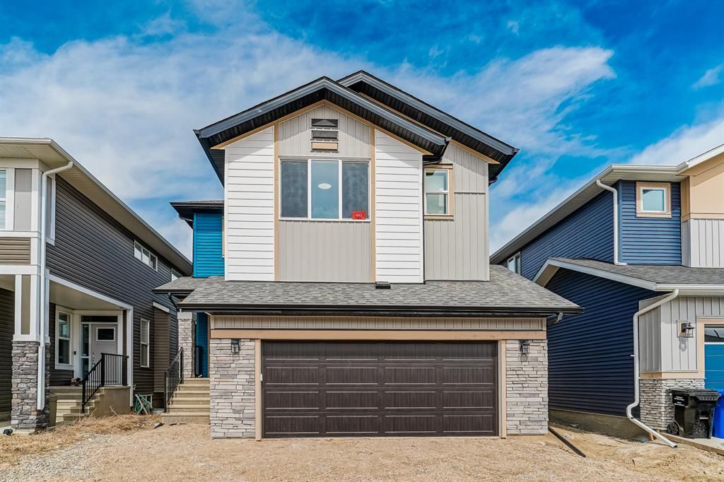 Main Photo: 90 Creekside Avenue SW in Calgary: C-168 Detached for sale : MLS®# A2051179