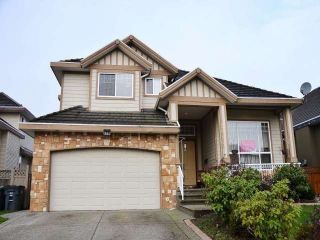 Photo 1: 7625 151A Street in Surrey: East Newton House for sale : MLS®# F1405104