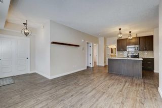 Photo 4: 1411 2461 Baysprings Link SW: Airdrie Row/Townhouse for sale : MLS®# A2125442