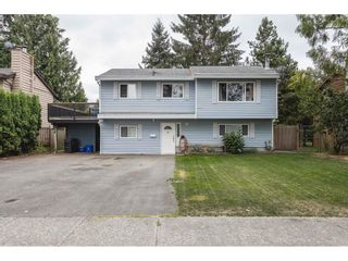 Photo 1: 26522 33 Avenue in Langley: Aldergrove Langley House for sale : MLS®# R2609624