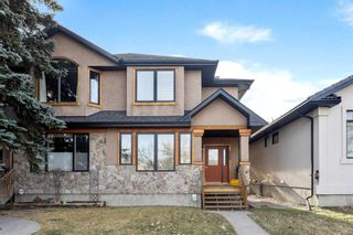 Photo 1: 525 26 Avenue NW in Calgary: Mount Pleasant Semi Detached (Half Duplex) for sale : MLS®# A2128119
