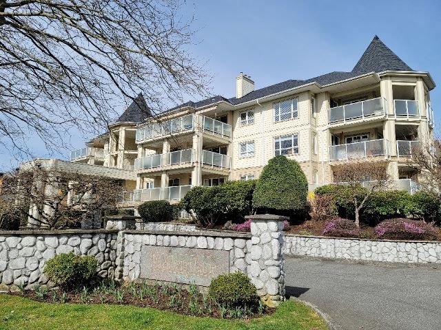 Main Photo: 311 20125 55A Avenue in Langley: Langley City Condo for sale in "BLACKBERRY LANE" : MLS®# R2552704