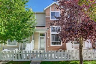 Photo 1: 132 Tuscany Court NW in Calgary: Tuscany Row/Townhouse for sale : MLS®# A2002638