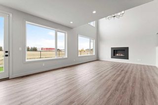 Photo 19: 56 Coulee Crescent SW in Calgary: Cougar Ridge Detached for sale : MLS®# A2116960