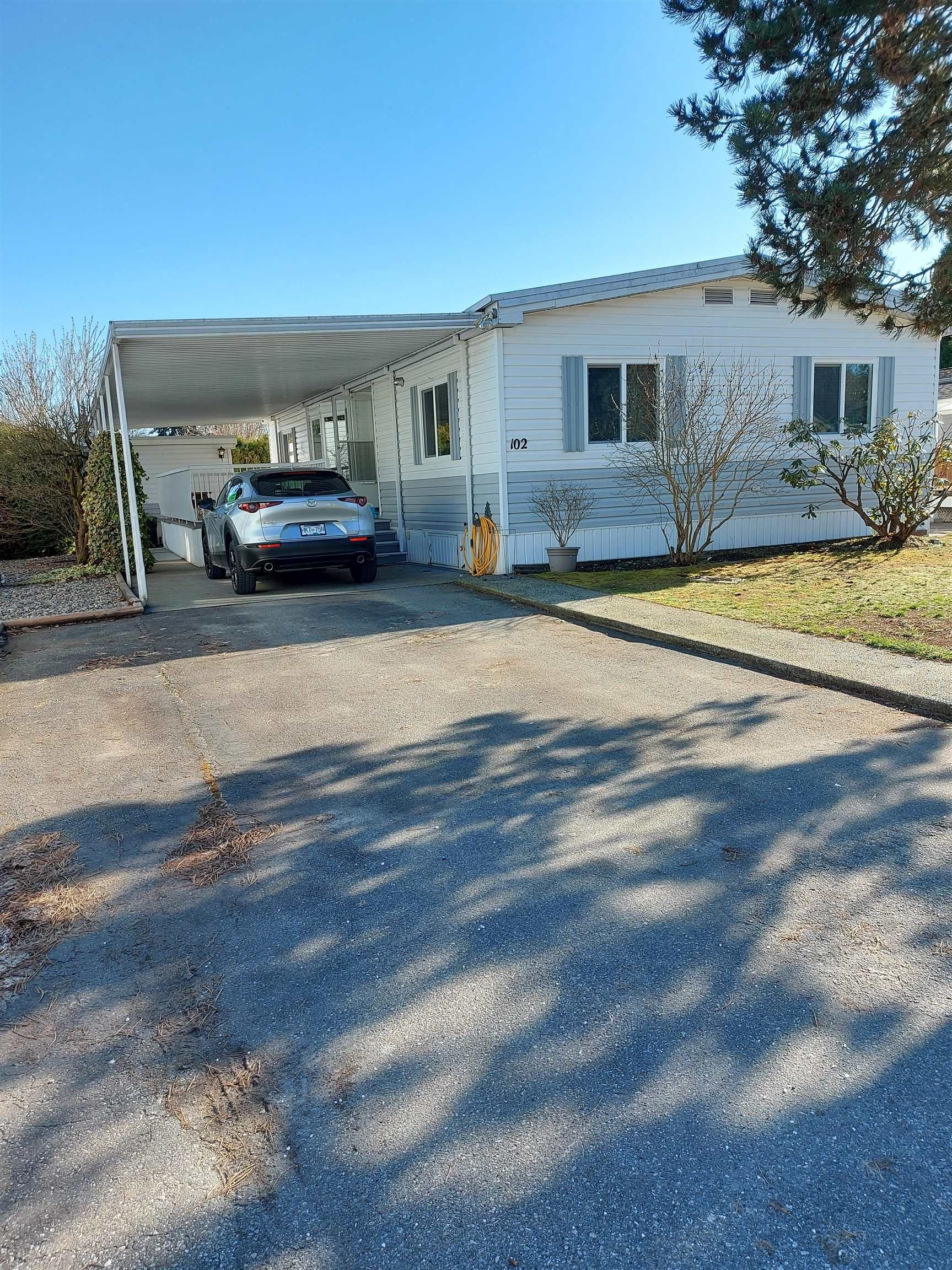 Main Photo: 102 145 KING EDWARD Street in Coquitlam: Maillardville Manufactured Home for sale in "MILL CREEK VILLAGE" : MLS®# R2663410