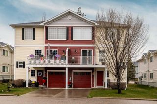 Photo 1: 157 Country Village Circle NE in Calgary: Country Hills Village Row/Townhouse for sale : MLS®# A2130475