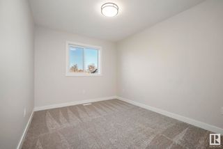 Photo 32: 11345 127 Street in Edmonton: Zone 07 House Half Duplex for sale : MLS®# E4381394