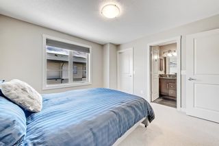 Photo 25: 1590 93 Street SW in Calgary: Aspen Woods Row/Townhouse for sale : MLS®# A2051141