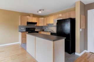Photo 10: 180 Simcoe Place SW in Calgary: Signal Hill Row/Townhouse for sale : MLS®# A1218089