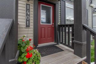 Photo 4: 1401 1001 8 Street NW: Airdrie Row/Townhouse for sale : MLS®# A1244941