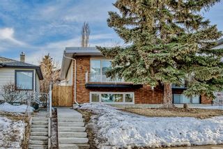 Photo 2: 219 26 Avenue NE in Calgary: Tuxedo Park Semi Detached (Half Duplex) for sale : MLS®# A2039098