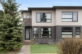 Photo 1: 2422 Bowness Road NW in Calgary: West Hillhurst Semi Detached (Half Duplex) for sale : MLS®# A2128647