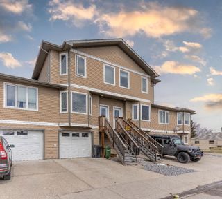 Photo 2: 103 30 Wellington Cove: Strathmore Row/Townhouse for sale : MLS®# A1209546