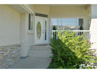 Photo 2: 134 GLENEAGLES View: Cochrane House for sale : MLS®# C4018773