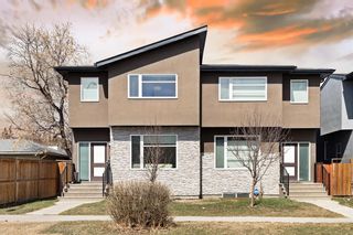 Main Photo: 210 17 Avenue NE in Calgary: Tuxedo Park Semi Detached (Half Duplex) for sale : MLS®# A2040884