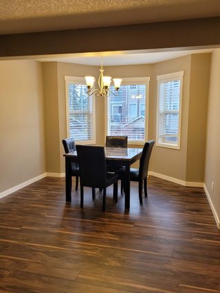 Photo 4: 104 7400 CREEKSIDE Way in Prince George: Creekside Townhouse for sale in "CREEKSIDE" (PG City South West)  : MLS®# R2731688