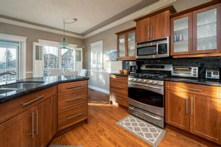 Photo 11: 318 Signature Court SW in Calgary: Signal Hill Semi Detached for sale : MLS®# A1177408