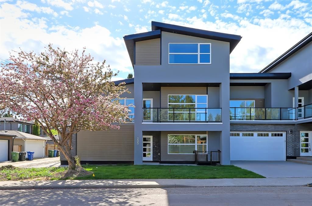 Main Photo: 205 35A Street SW in Calgary: Spruce Cliff Semi Detached for sale : MLS®# A1106362