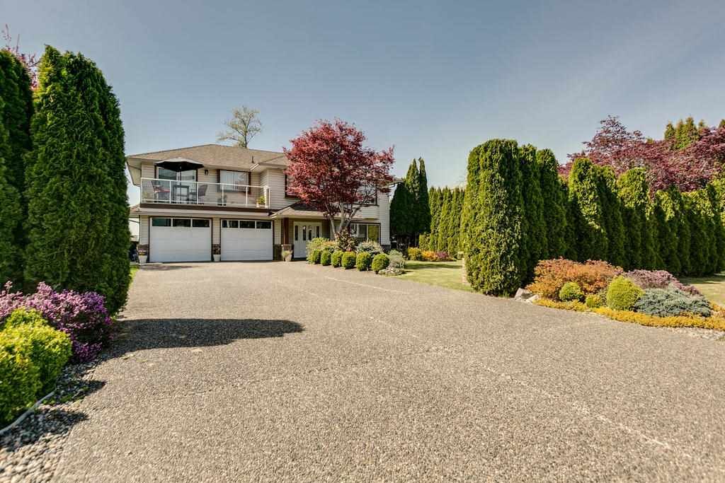 Main Photo: 12403 188 Street in Pitt Meadows: West Meadows House for sale in "HIGHLAND PARK AREA" : MLS®# R2261078