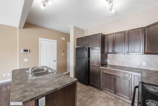 Photo 4: 501 620 Luxstone Landing SW: Airdrie Row/Townhouse for sale : MLS®# A2029244