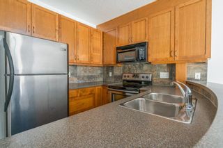 Photo 8: 202 8 Hemlock Crescent SW in Calgary: Spruce Cliff Apartment for sale : MLS®# A2014610