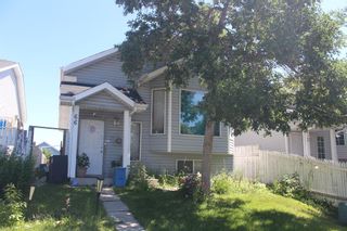 Photo 1: 66 Erin Meadow Close SE in Calgary: Erin Woods Detached for sale : MLS®# A1241814