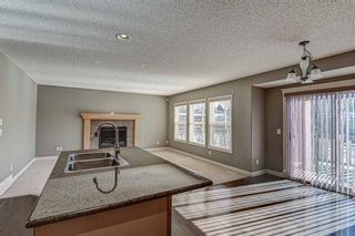 Photo 7: 32 Everwillow Green SW in Calgary: Evergreen Detached for sale : MLS®# A1188019