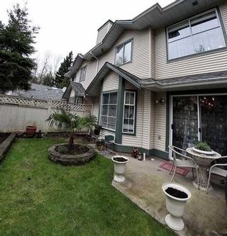 Photo 9: 107 8655 KING GEORGE Boulevard in Surrey: Queen Mary Park Surrey Townhouse for sale in "Creekside Village" : MLS®# F1305192