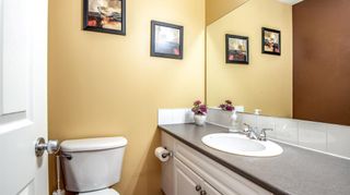 Photo 5: 108 Stonemere Place: Chestermere Row/Townhouse for sale : MLS®# A1259349