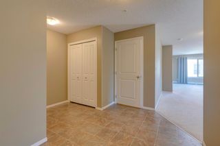 Photo 4: 9302 403 MACKENZIE Way SW: Airdrie Apartment for sale : MLS®# A1032027