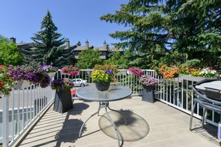 Photo 2: 54 Gladstone Gardens SW in Calgary: Glamorgan Row/Townhouse for sale : MLS®# A1241387