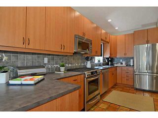 Photo 4: 4381 QUEBEC Street in Vancouver: Main House for sale in "MAIN STREET" (Vancouver East)  : MLS®# V1003822