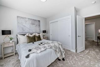 Photo 23: 408 Shawnee Square SW in Calgary: Shawnee Slopes Row/Townhouse for sale : MLS®# A2117182