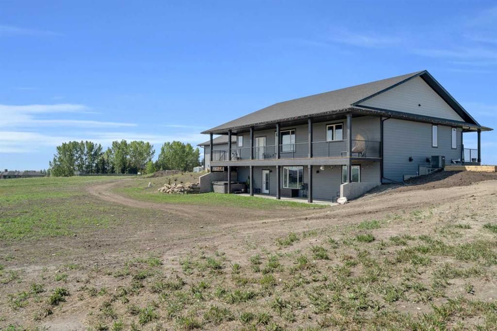 Welcome to 64135 Eastway Drive E, Foothills County