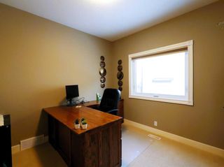 Photo 8: 54 Everglade Way SW in Calgary: Evergreen Detached for sale : MLS®# A2103795